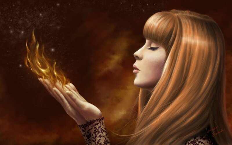 woman with fire in her hands