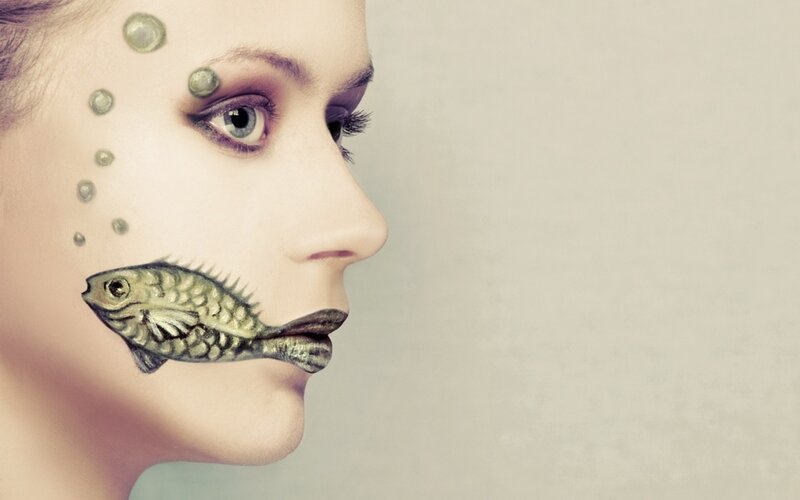 woman with fish face art