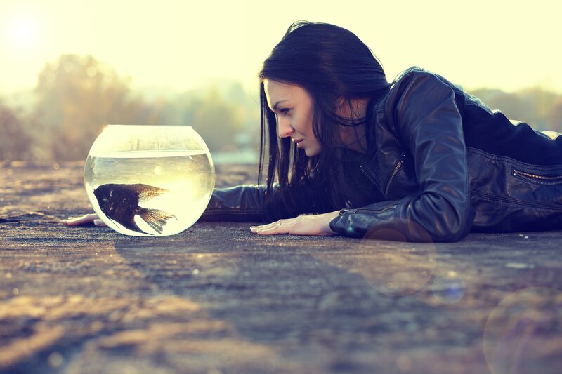 Woman with Fishbowl — Brown