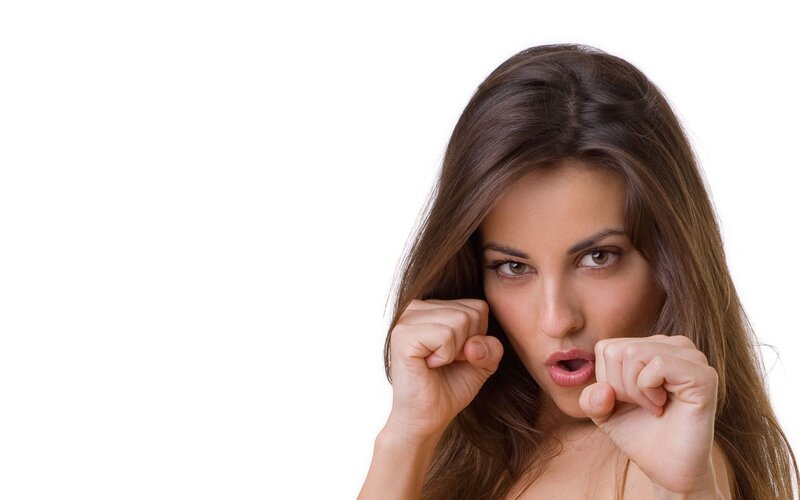 woman with fists clenched
