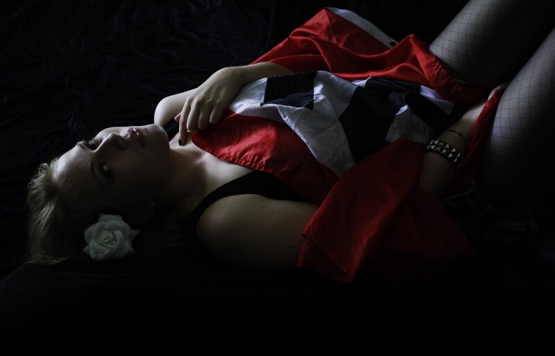 woman with flag and rose