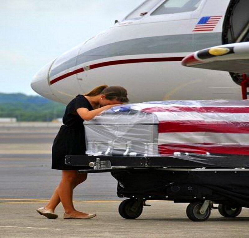 Woman with Flag-draped Casket