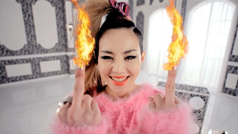 woman with flaming fingers