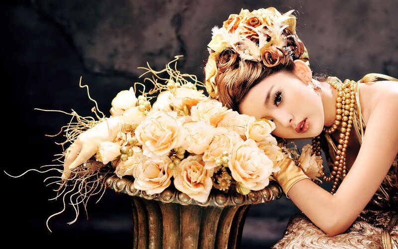woman with floral crown and bouquet
