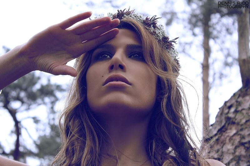 woman with floral crown in forest