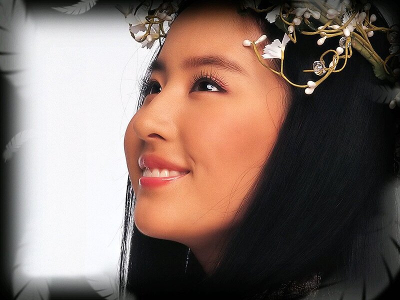 woman with floral crown smiling