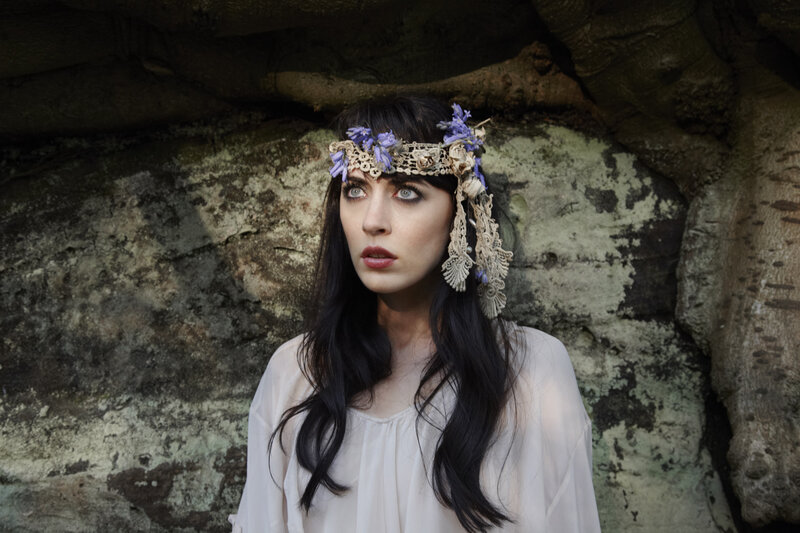 Woman with Floral Crown — White, Dramatic, Photograph