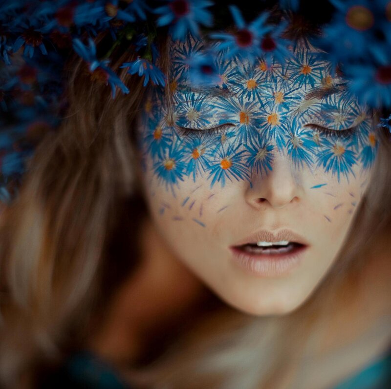 Woman with Floral Face Paint — Blue