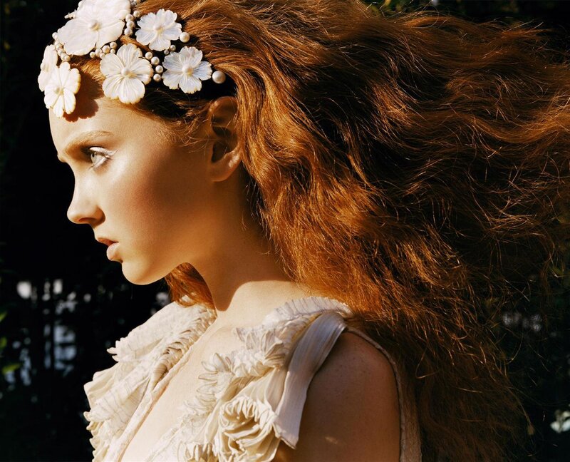 woman with floral headpiece