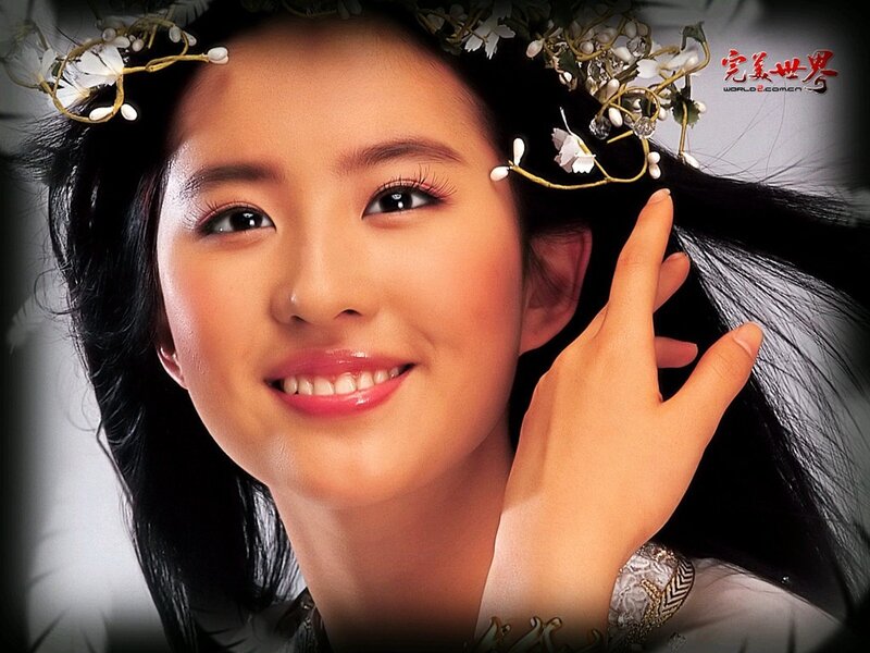 woman with floral headpiece smiling