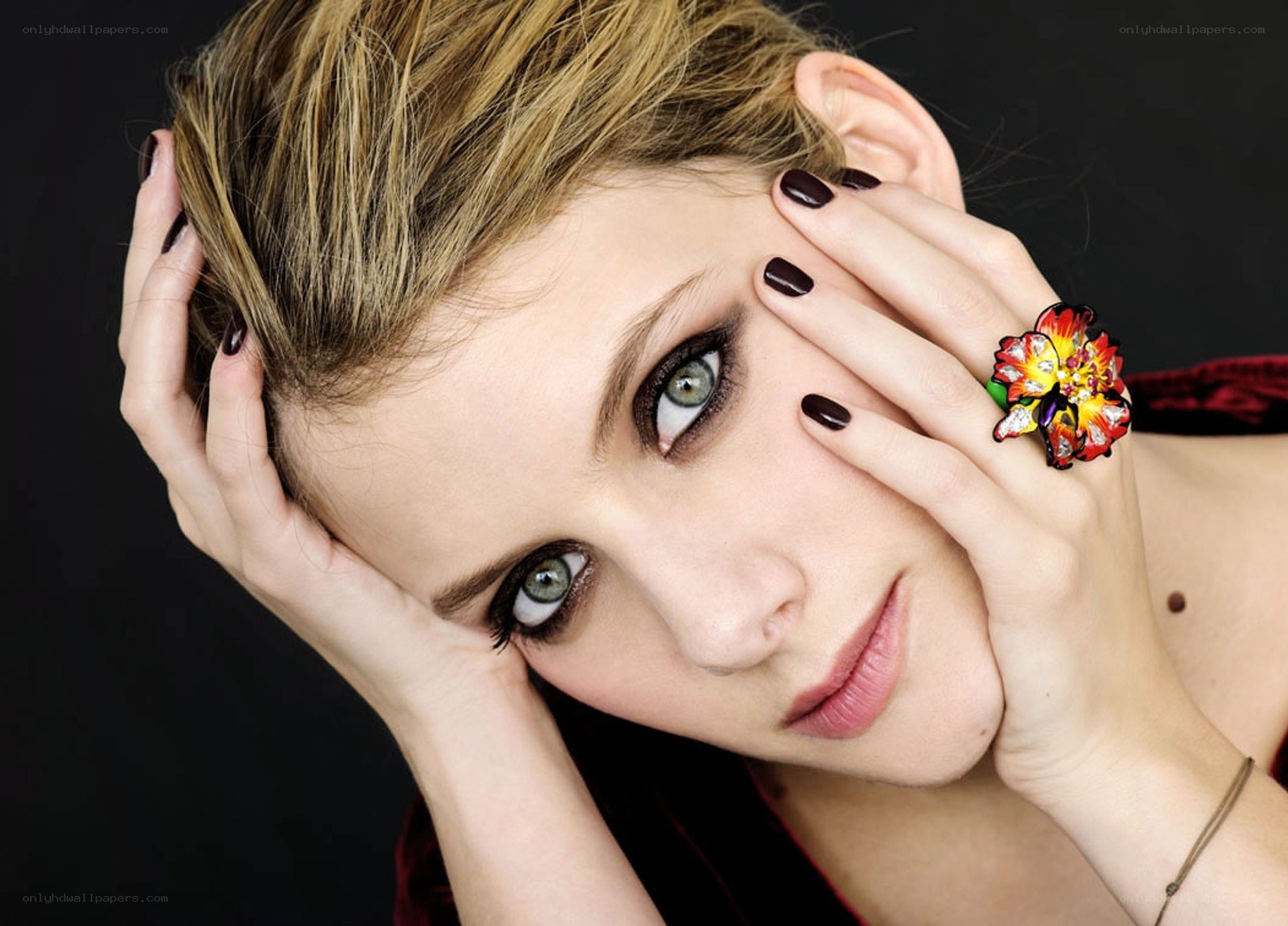 woman with floral ring