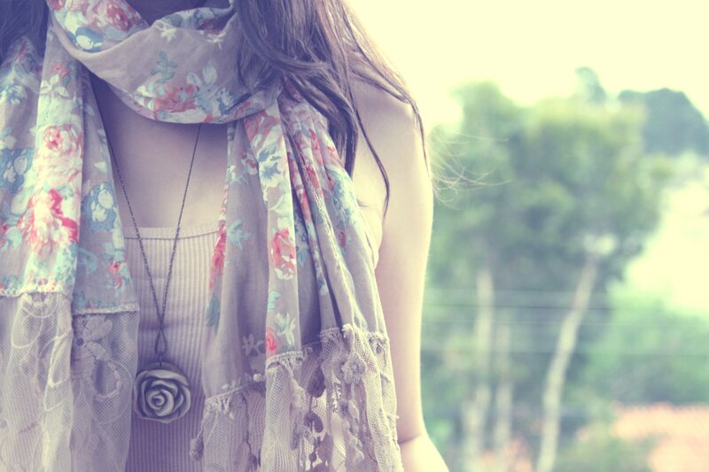 woman with floral scarf