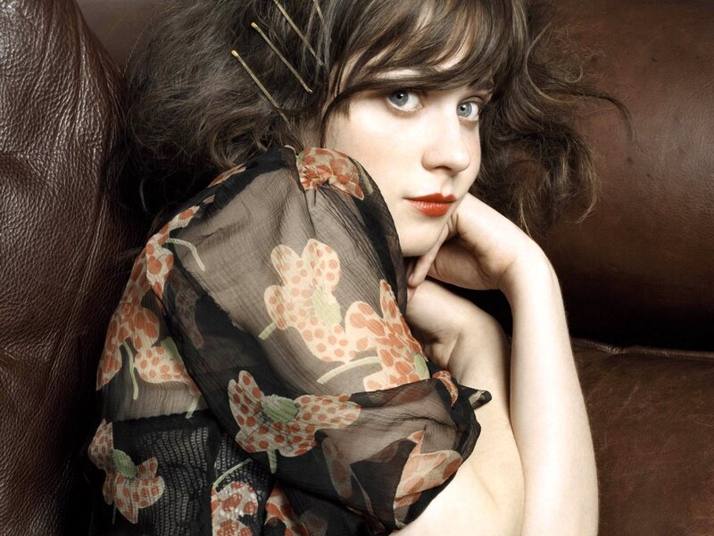 woman with floral scarf on couch