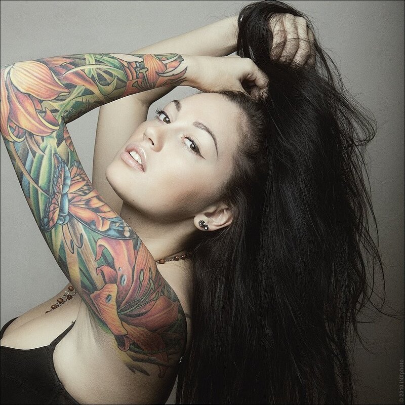 woman with floral tattoo