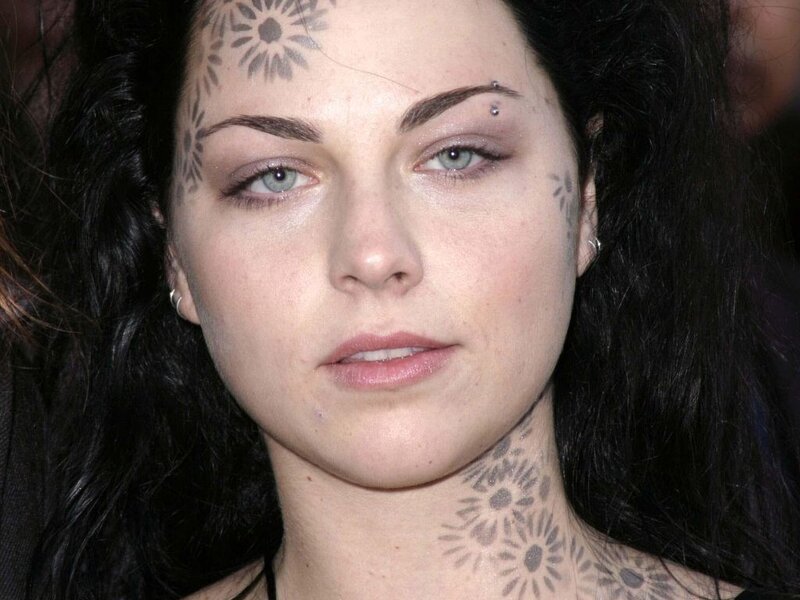 woman with floral tattoos