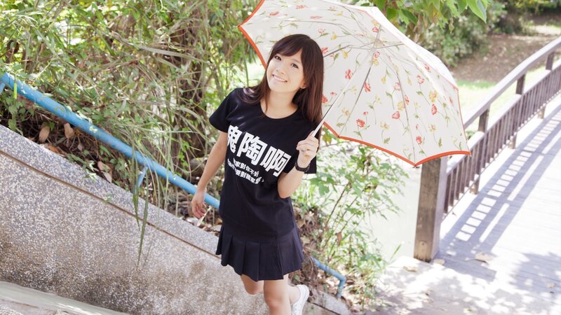 woman with floral umbrella