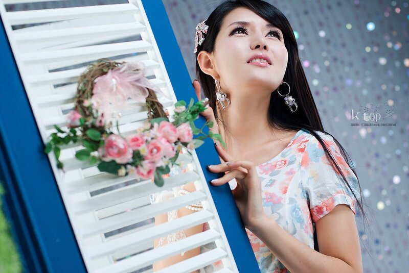 woman with floral wreath
