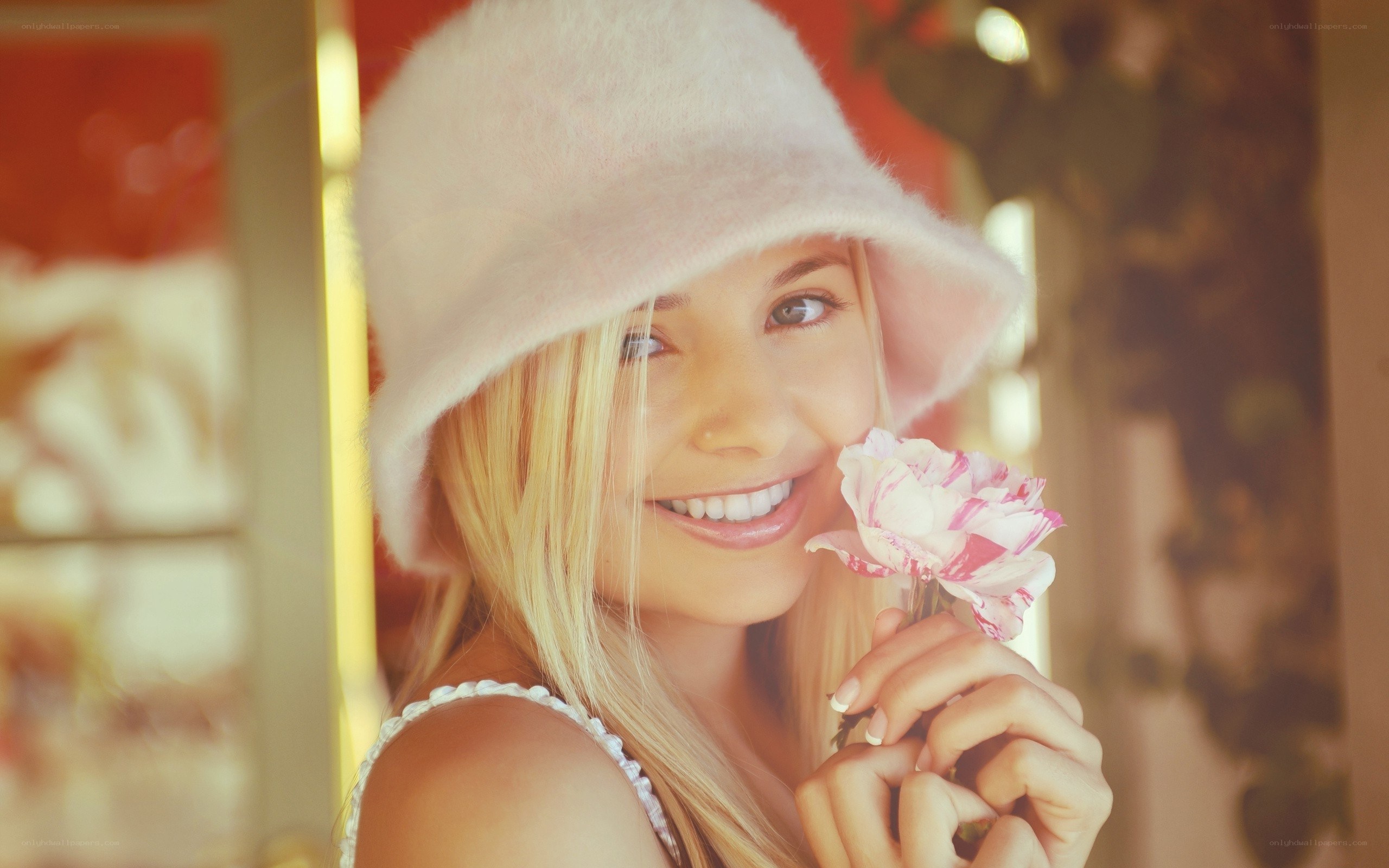 woman with flower and hat