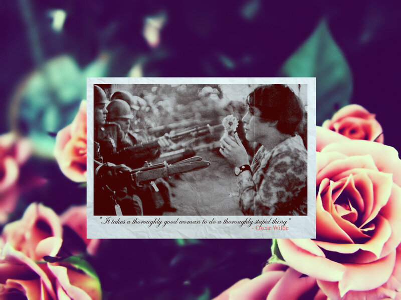 woman with flower confronts soldiers