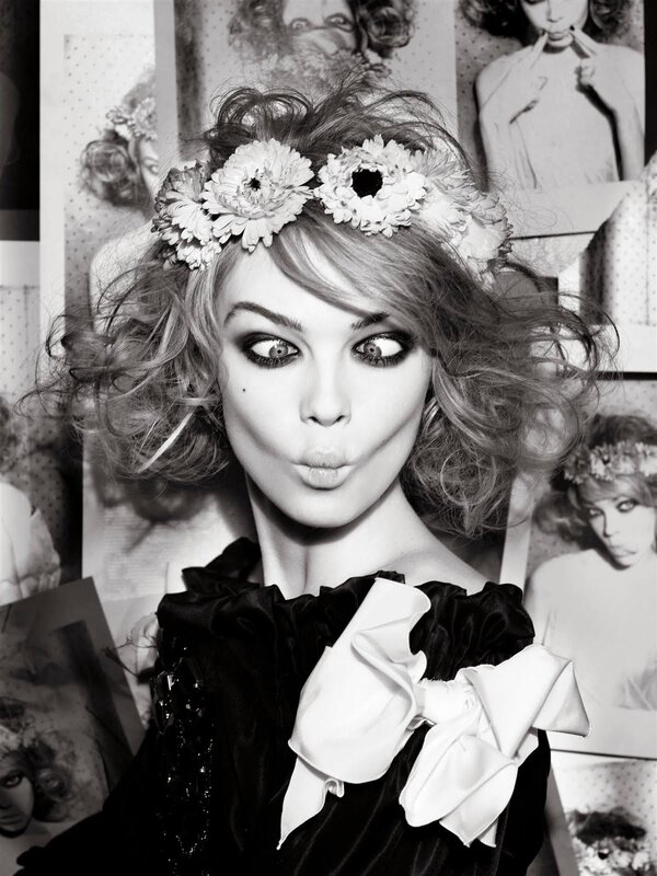 woman with flower crown and bold makeup