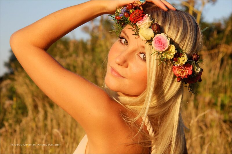 woman with flower crown in field