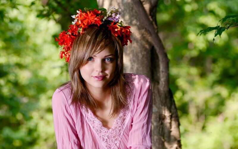 woman with flower crown in forest
