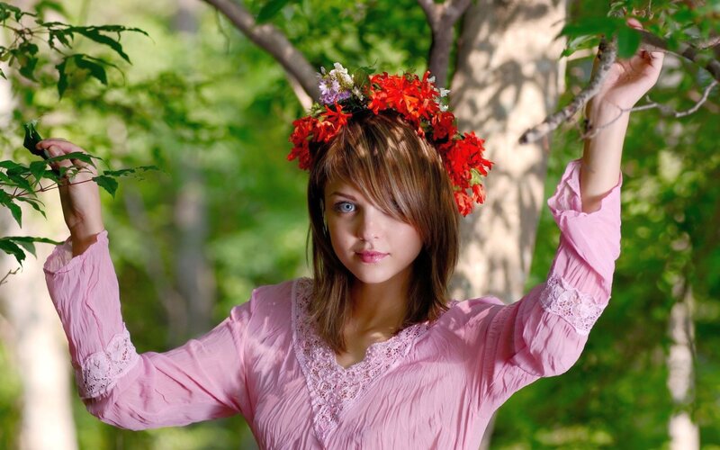 woman with flower crown in forest