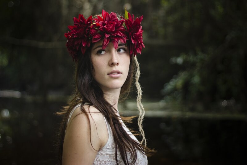 woman with flower crown in forest