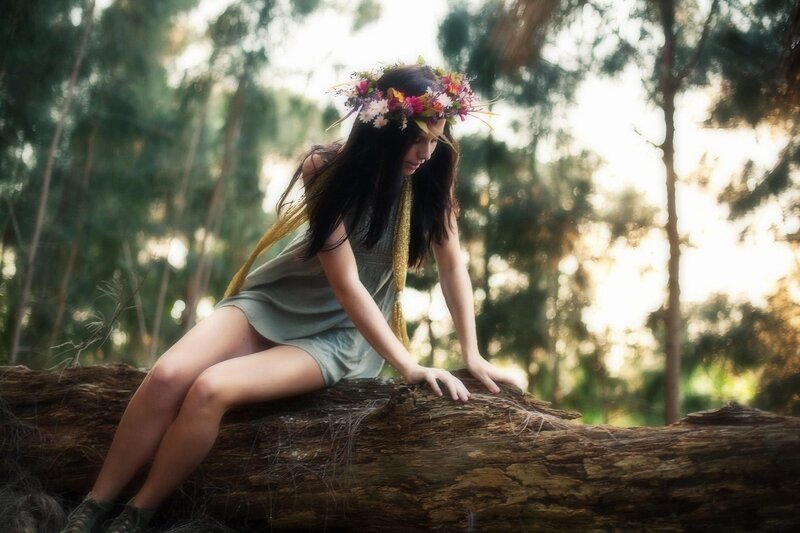 woman with flower crown in forest