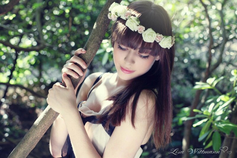 woman with flower crown in forest