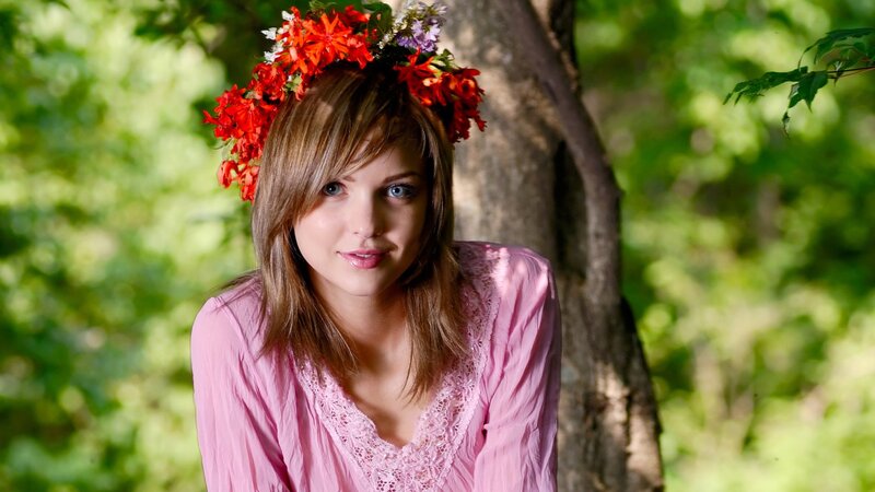 woman with flower crown in forest
