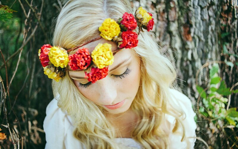 woman with flower crown in forest