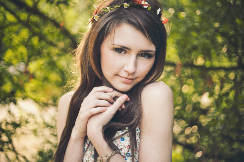 woman with flower crown in garden