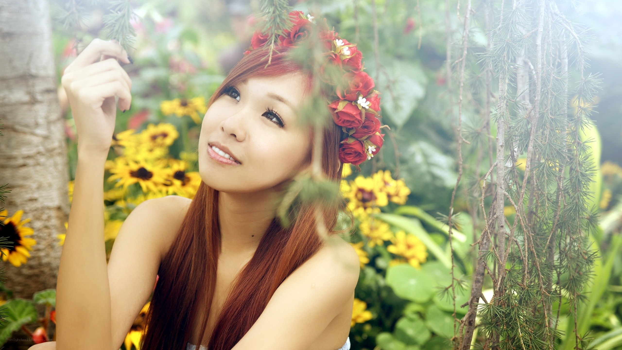woman with flower crown in garden