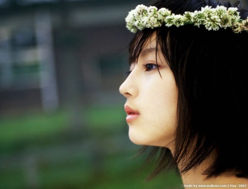 woman with flower crown in profile