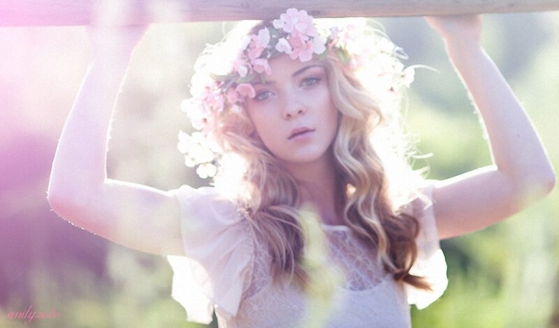 woman with flower crown in sunlight