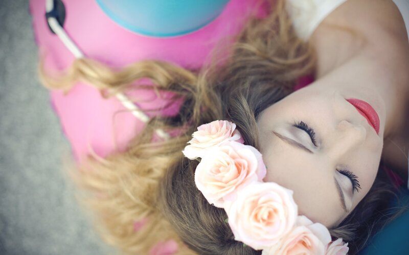 woman with flower crown sleeping