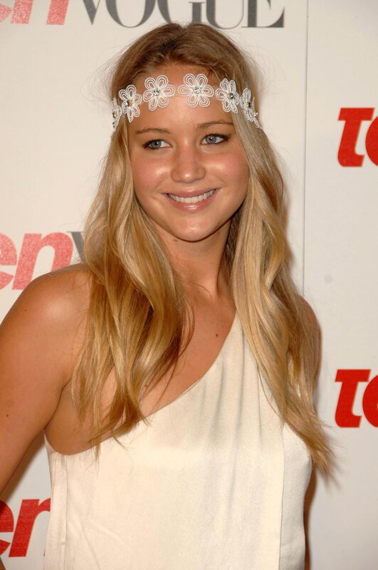 woman with flower crown smiling