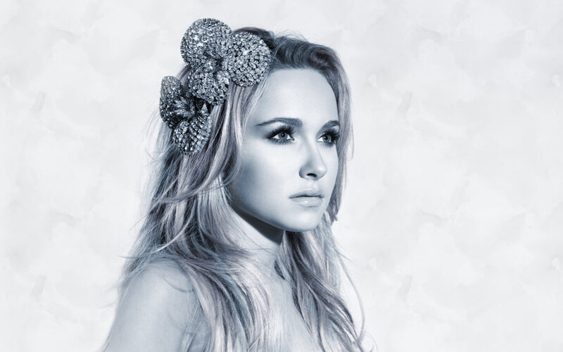 Woman with Flower Hair Accessory — Gray