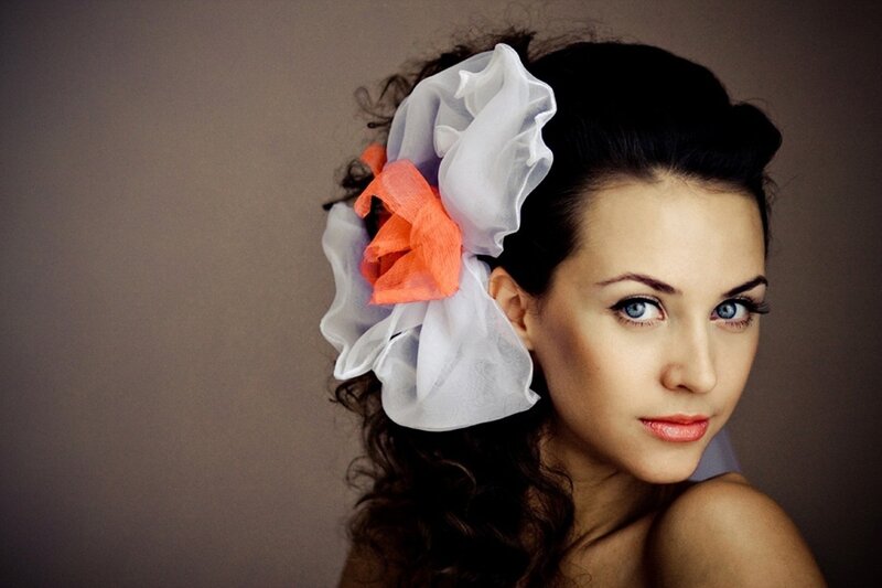 Woman with Flower Hair Accessory — White