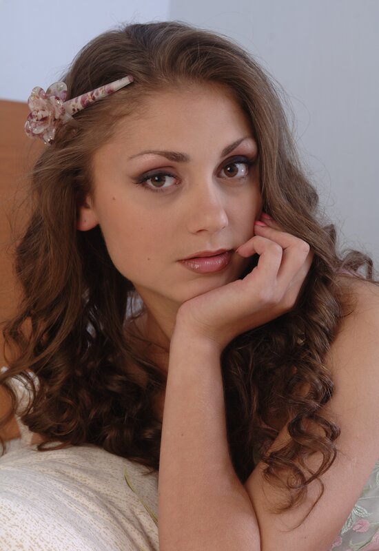 woman with flower hair clip