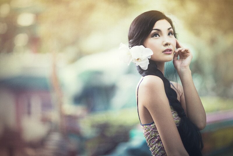 woman with flower in hair