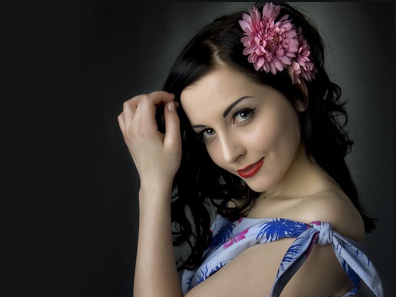 Woman with Flower in Hair — Black, Dramatic, Photograph