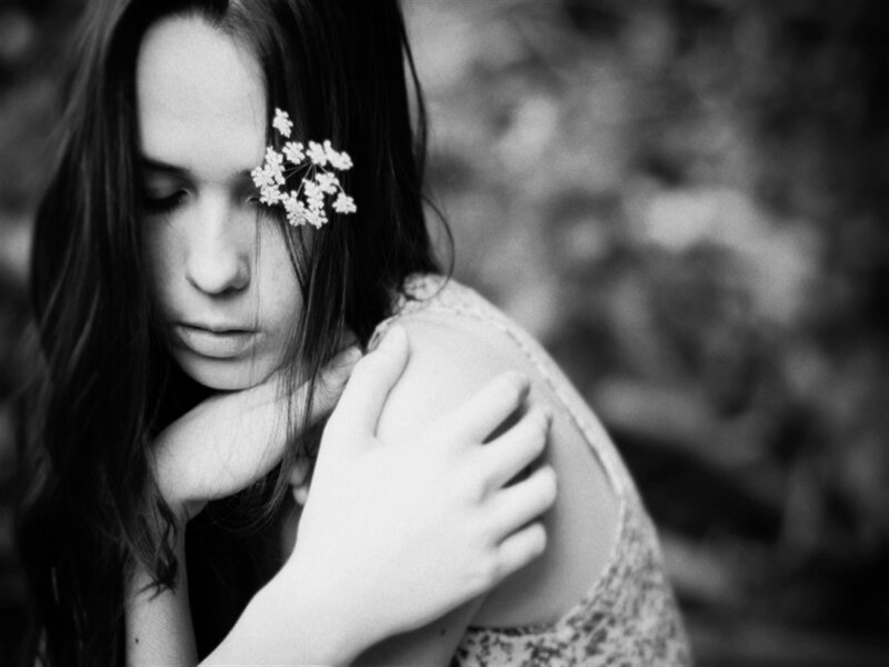 Woman with Flower in Hair — Black, Melancholic