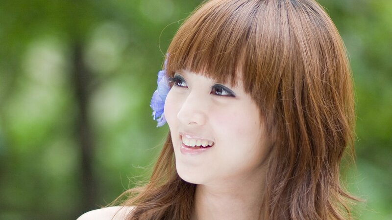 Woman with Flower in Hair — Brown, Serene, Afternoon, Photograph, Smile