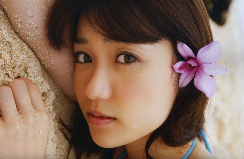 Woman with Flower in Hair — Brown, Serene, Summer