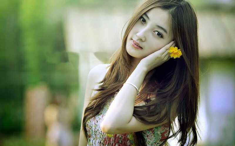 Woman with Flower in Hair — Green, Serene, Afternoon, Photograph, Hand