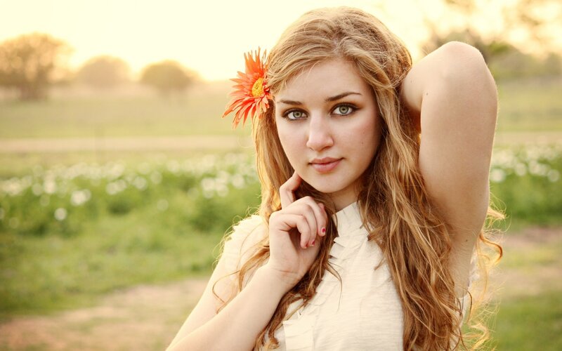 Woman with Flower in Hair — Green, Serene, Sunset