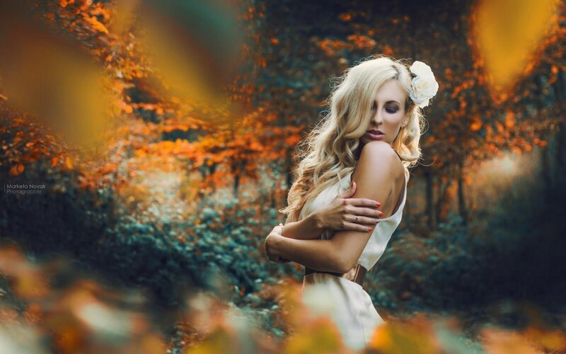 Woman with Flower in Hair — Orange, Serene
