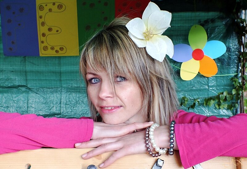 Woman with Flower in Hair — Pink, Playful